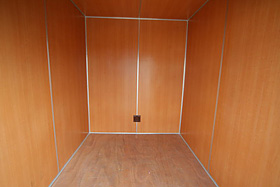Customer loading an Economy Self Storage room